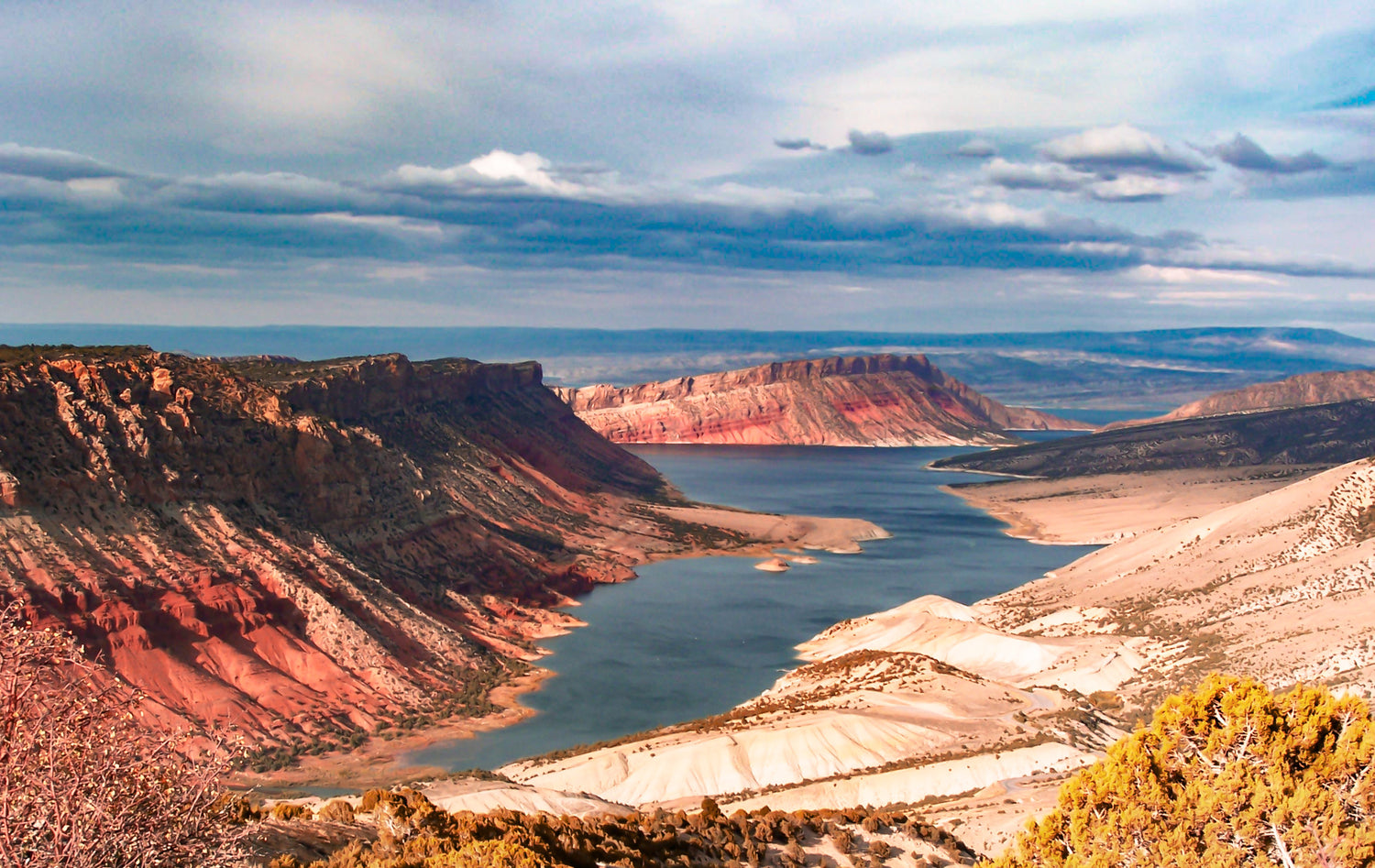 Nature photography print of  Flaming Gorge.  A desert valley with a river winding through it.