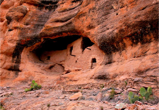 Nature Photography print of Gila Ruins Rock formation with a small cave-like structure in a desert landscape